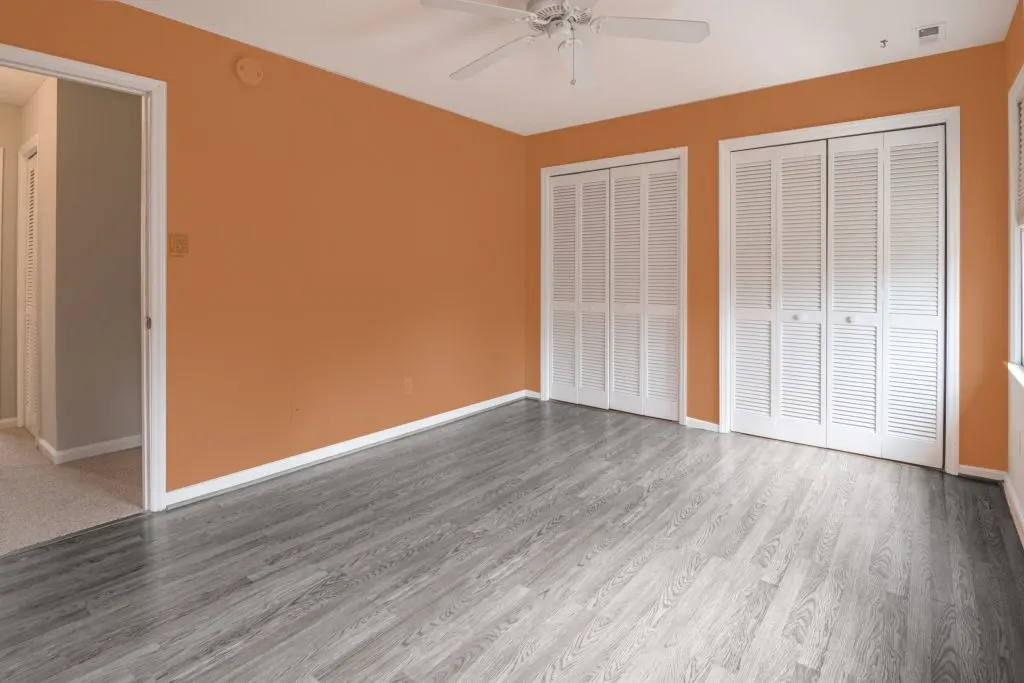 Orange walls and gray floors