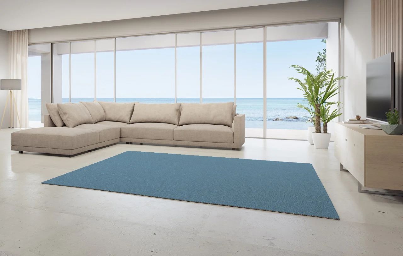 Misty Blue Rug and Beige Couch