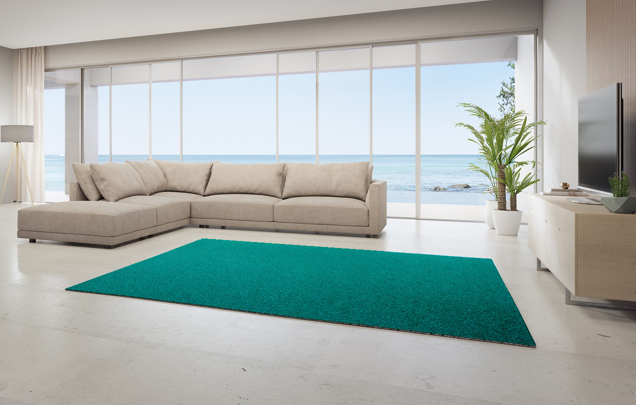 Rich Teal Rug and Beige Couch