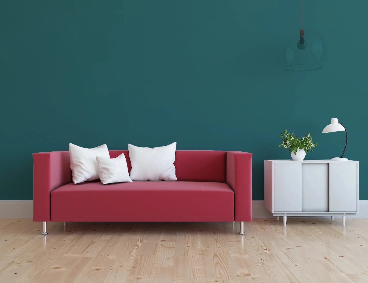 teal walls with red couch