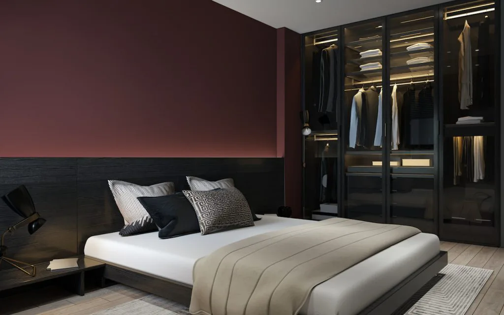 burgundy walls with black bedroom furniture