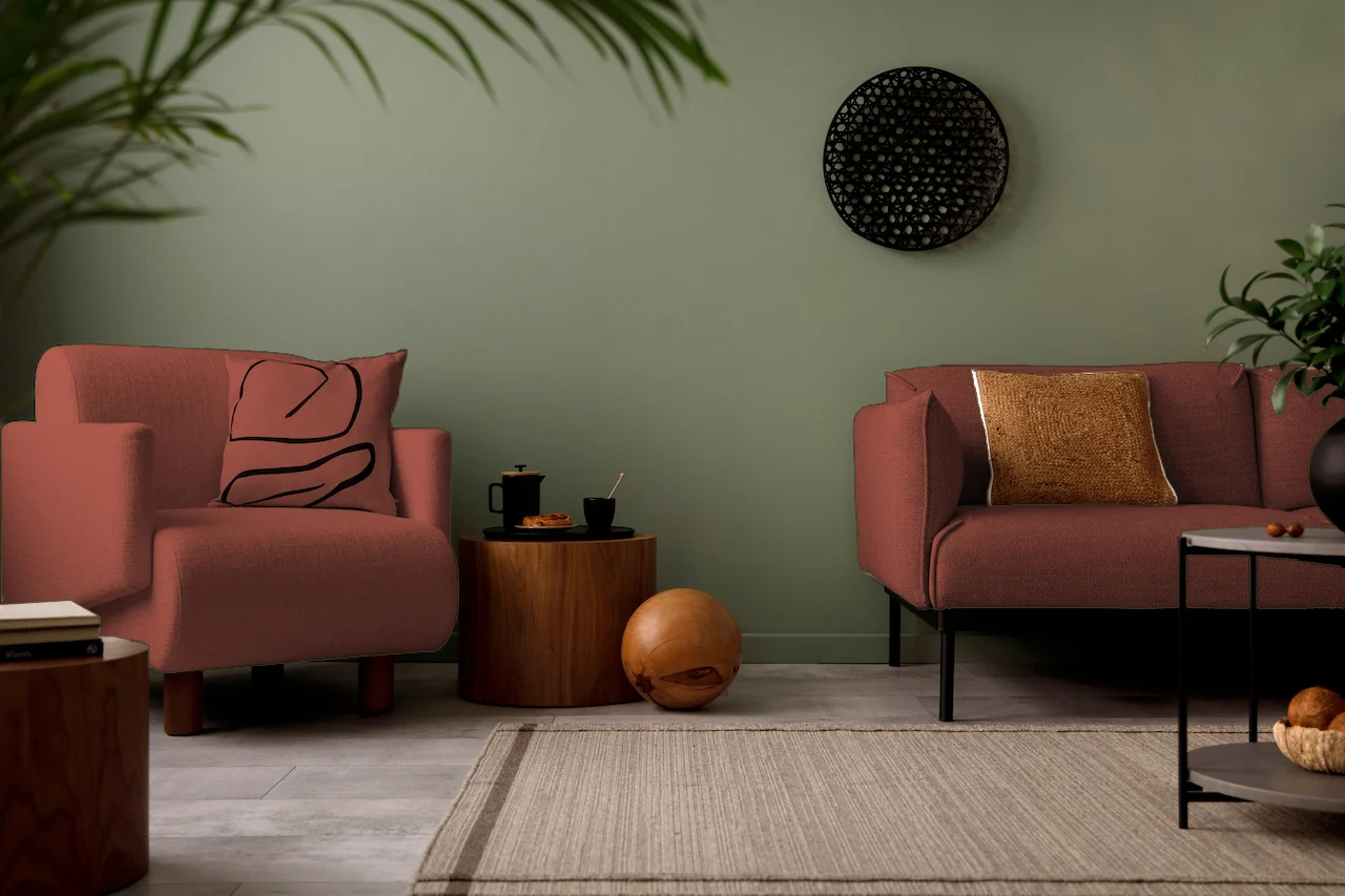 terracotta furniture with green walls