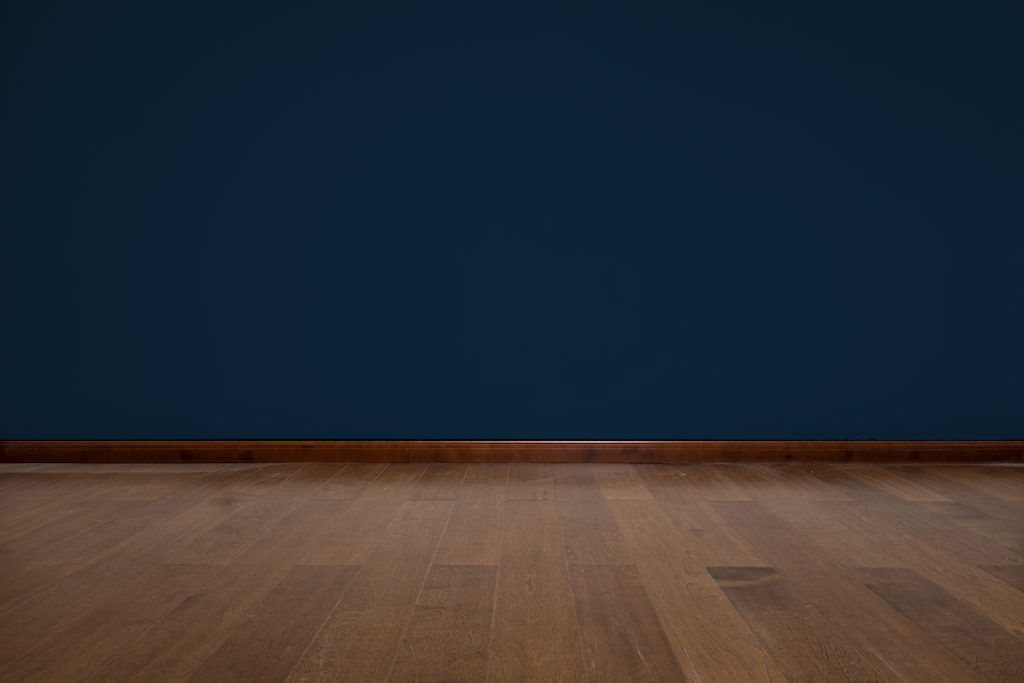navy walls with brown floors